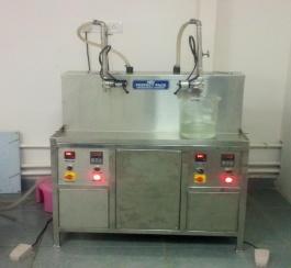 OIL FILLING MACHINE - 4 HEAD 